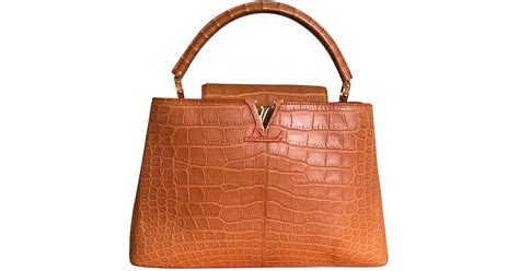 bolsas de piel de cocodrilo louis vuitton|louis vuitton mujer.